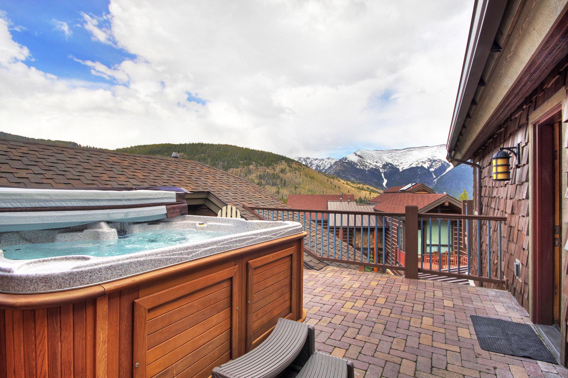 The private hot tub features great mountain views