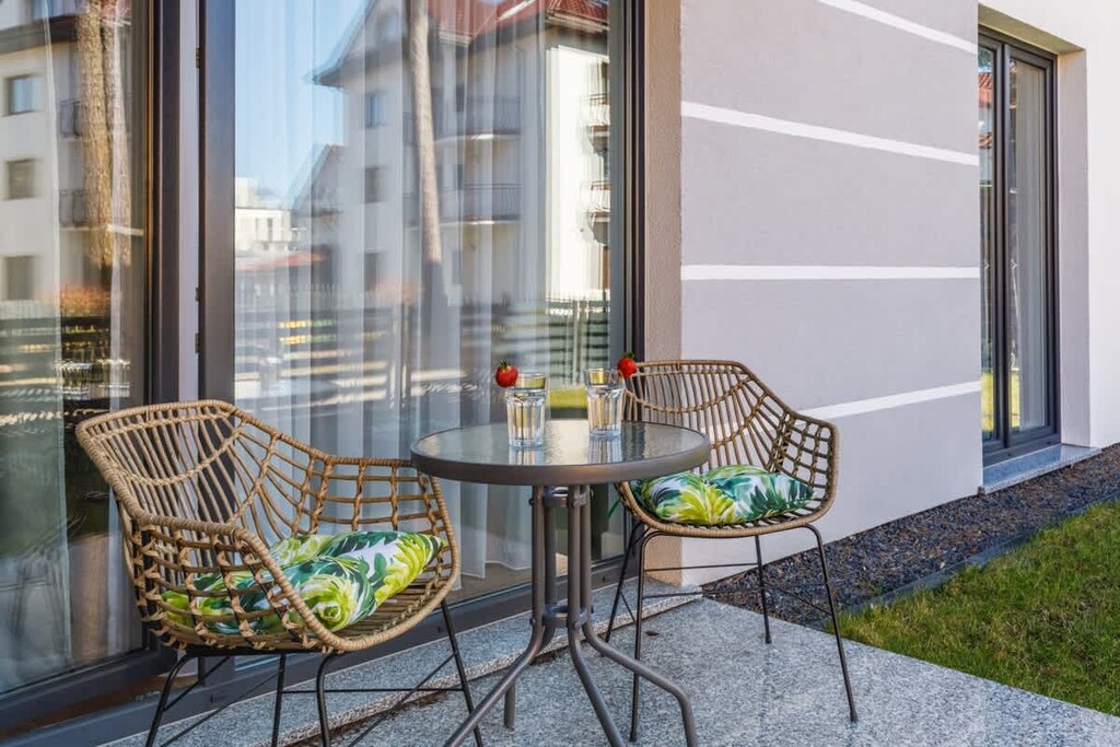 Terrace with garden furniture, where the guests can eat a snack.