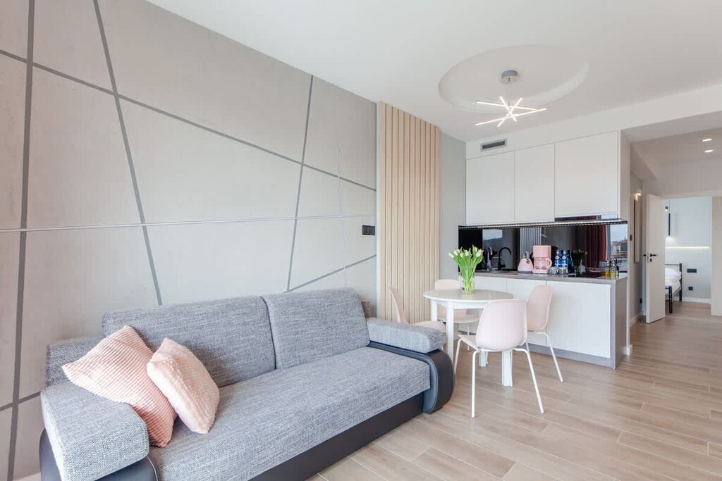 Living room with a comfortable sofa and TV. 