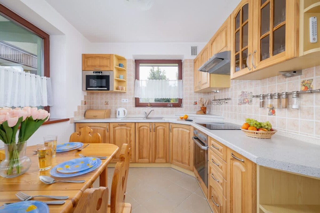 The kitchen's modern appliances make meal preparation easy.