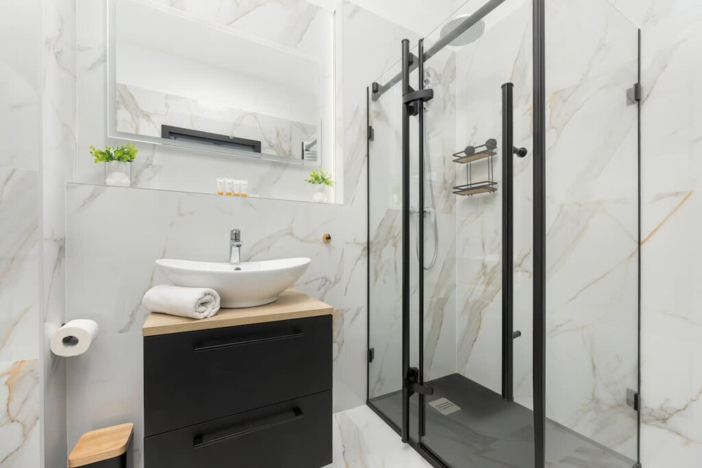 Comfortable bathroom with hairdryer. 