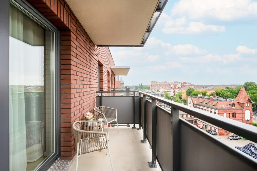Balcony view over the city
Private outdoor space with views of the neighborhood and skyline.