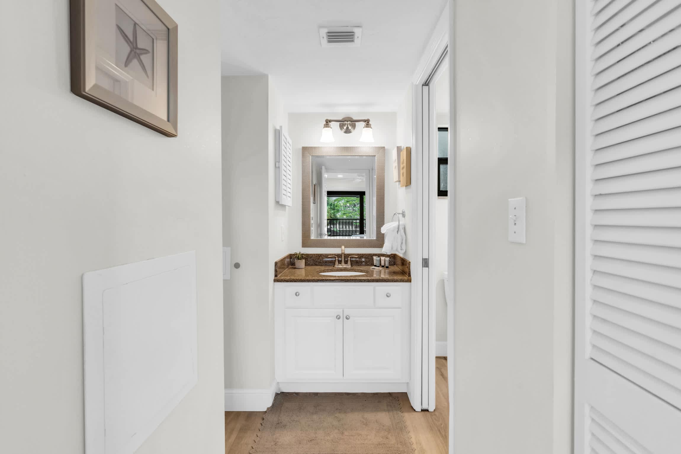 Bathroom #2 has a single modern vanity and large mirror
Bathroom #2 has a single modern vanity and large mirror