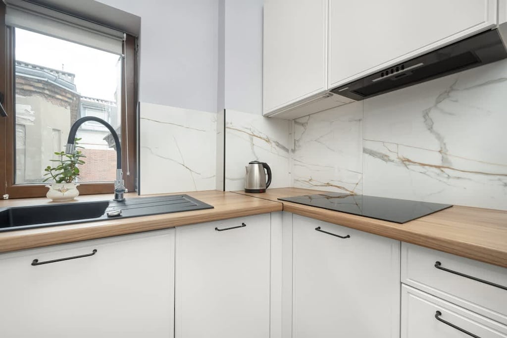 Separate kitchen with a kettle.