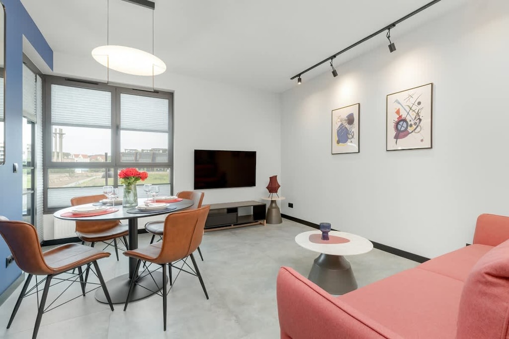 Living room with kitchenette.