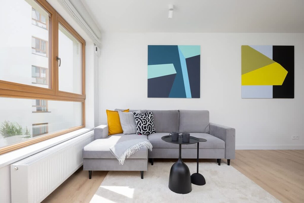 Living room with a comfortable sofa and TV. 