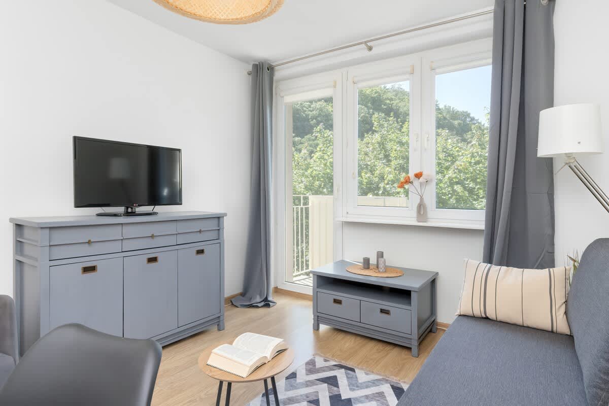 The bedroom's modern design ensures a comfortable stay. 