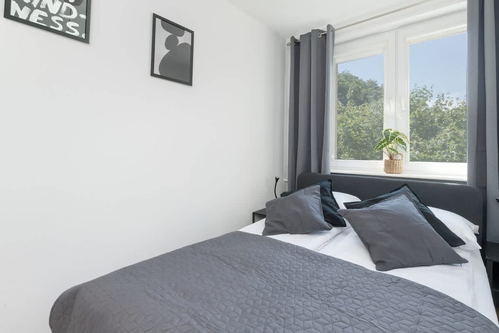 The bedroom features a luxurious double bed for a restful night's sleep. 