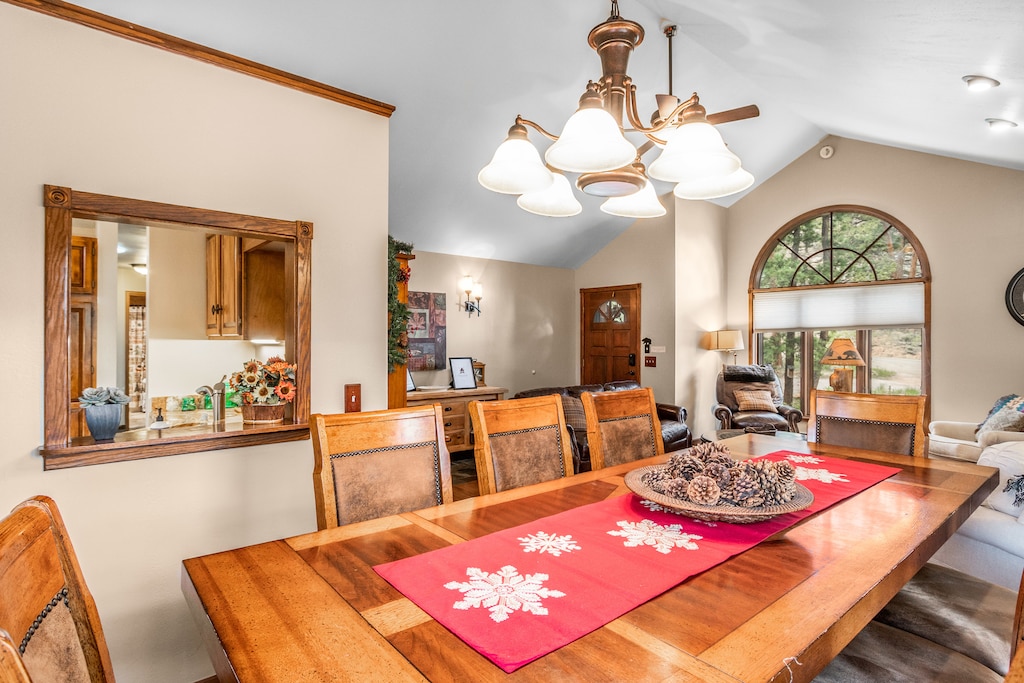 Dining room table adjacent to the living room.