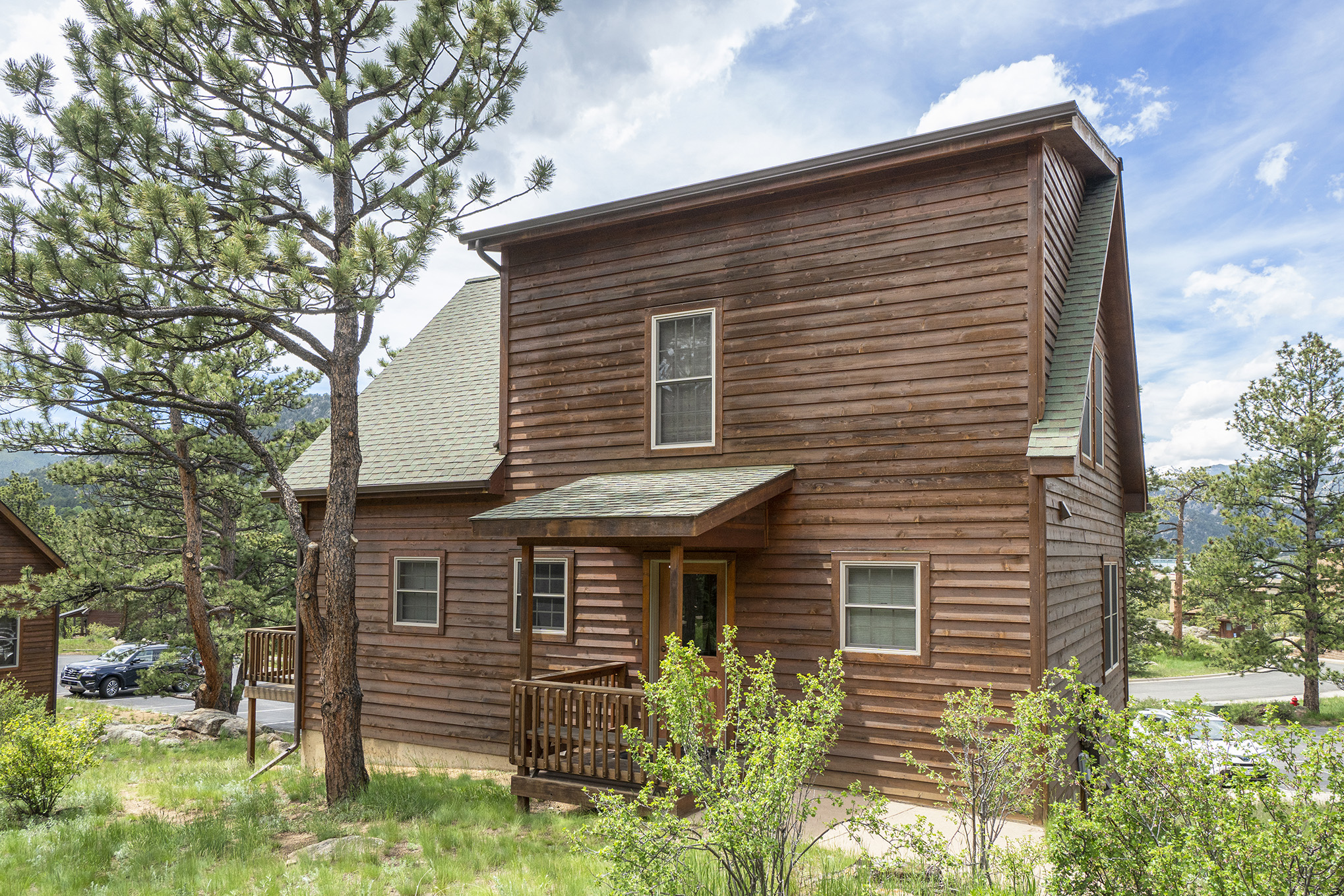 Exterior view of cabin and front door.