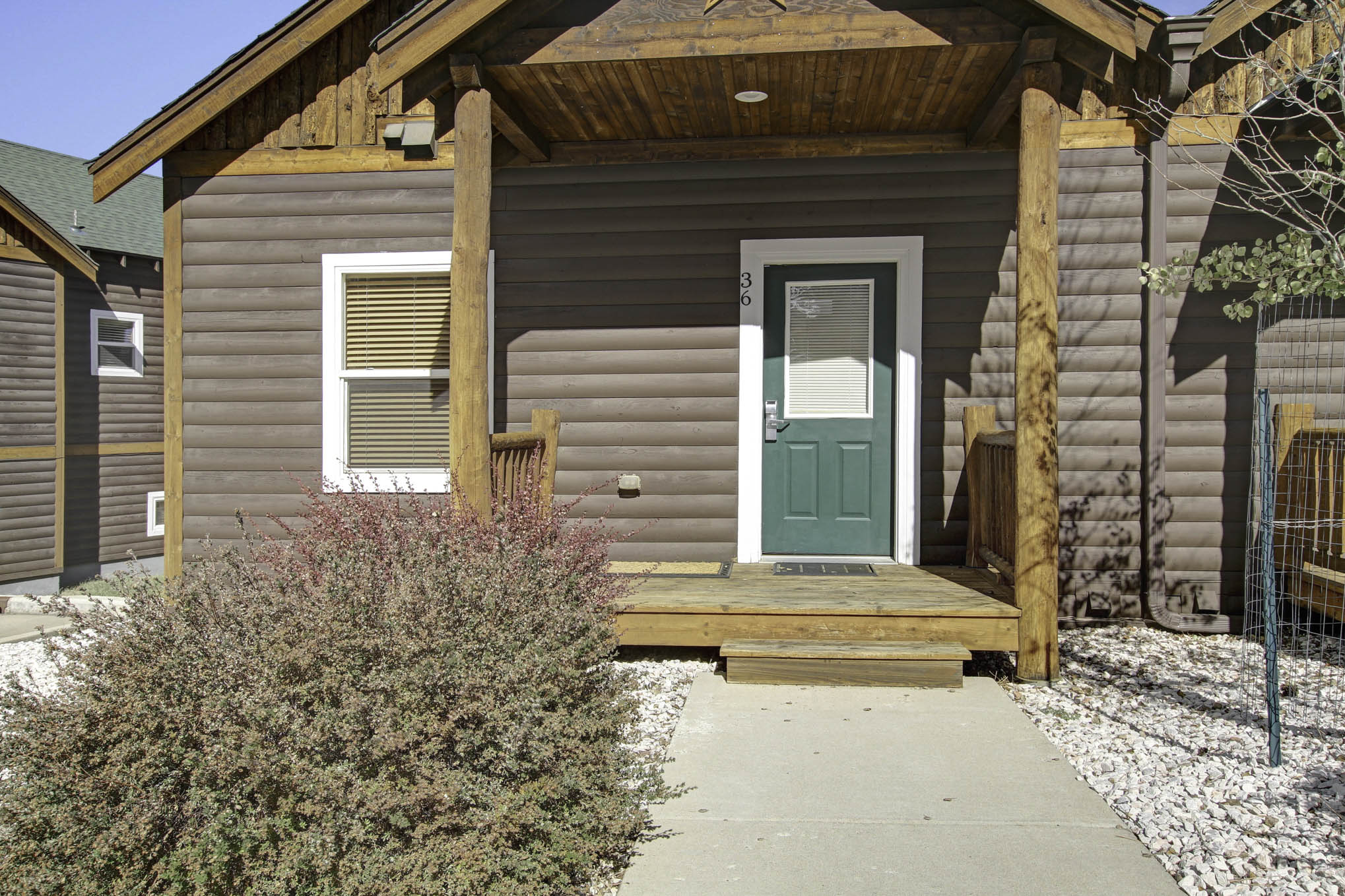 Single step up into the condo's main entrance.