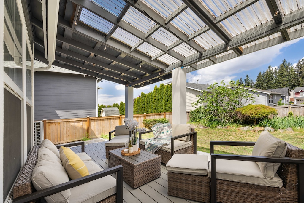 The covered patio in the backyard