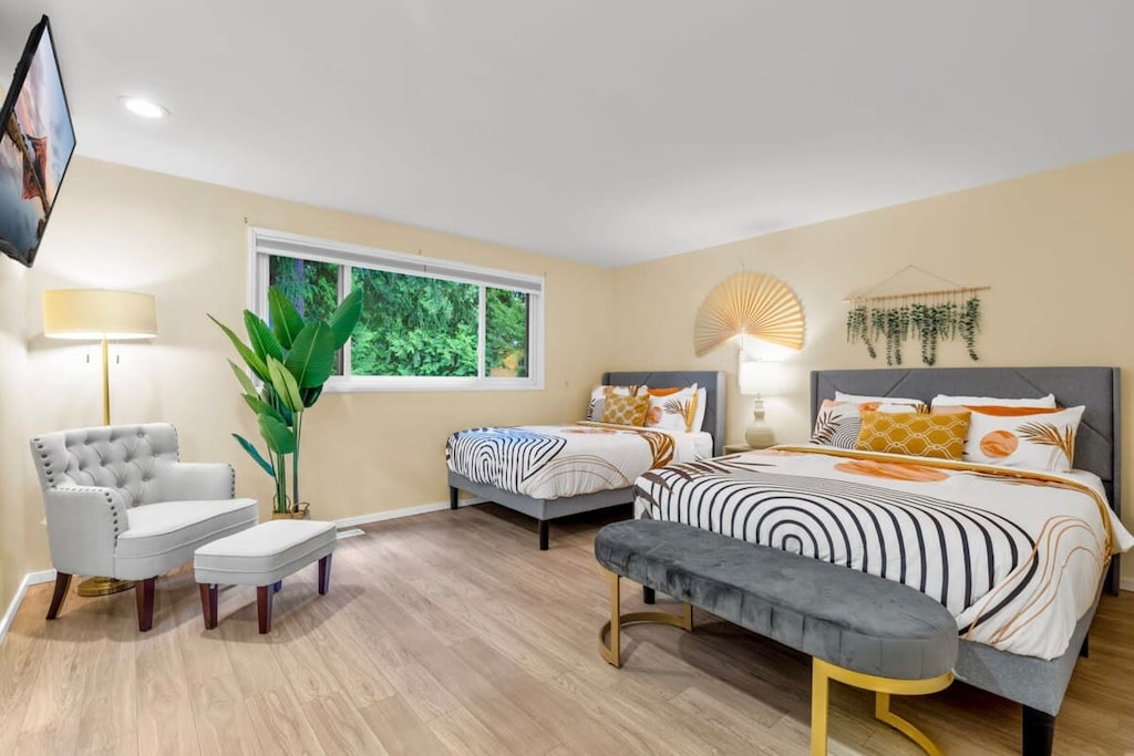 Here is the master bedroom with a cozy reading chair