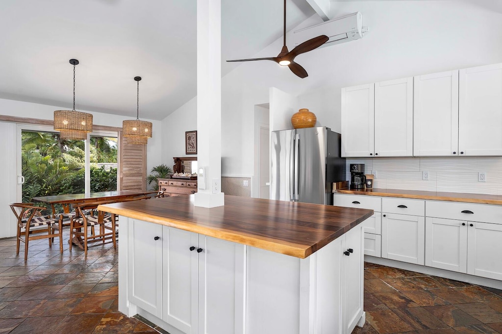 Prep meals in a jiffy in the kitchen with wide counter spaces.