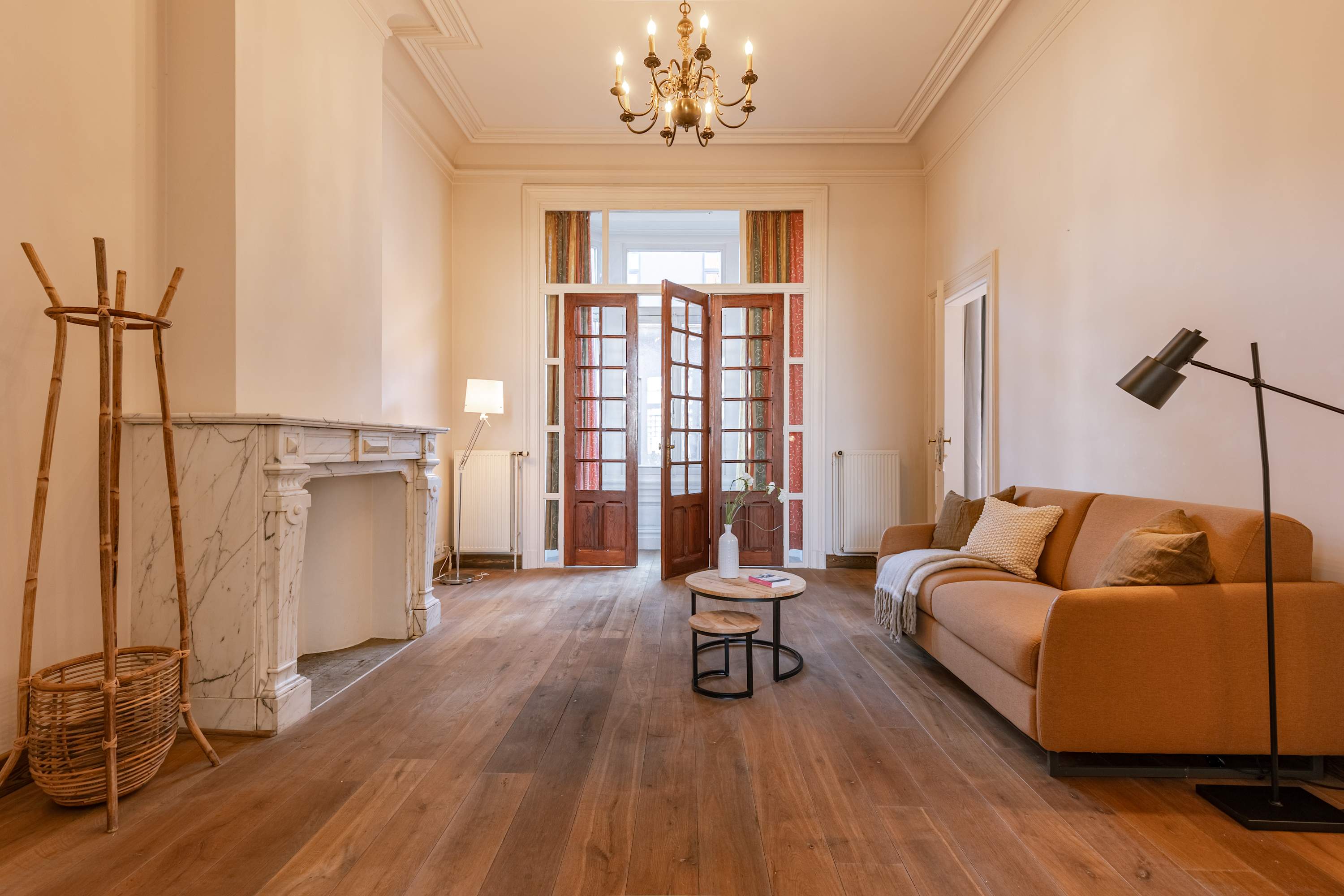 Bright and spacious living room featuring authentic elements.