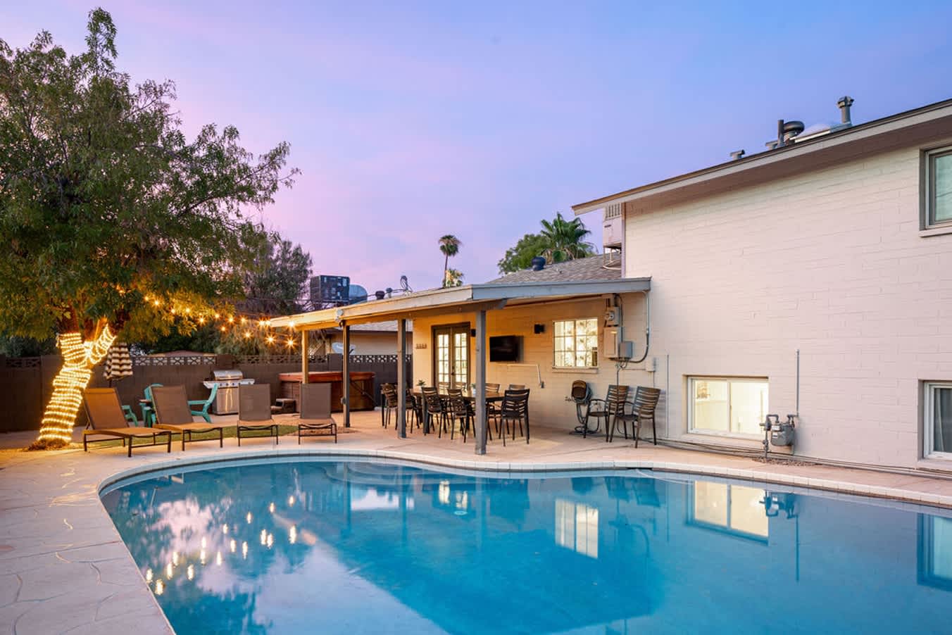 This backyard is a treat in itself! wide open spaces and a pool to keep you cool on those hot days!