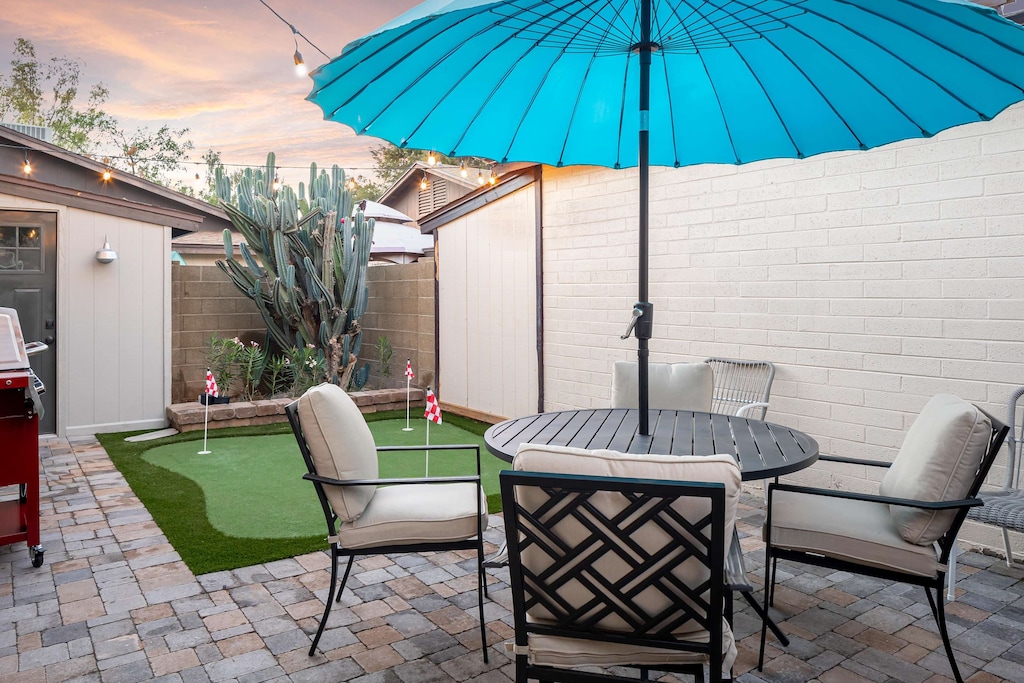 Creative spaces like this golfing putting green in backyard.