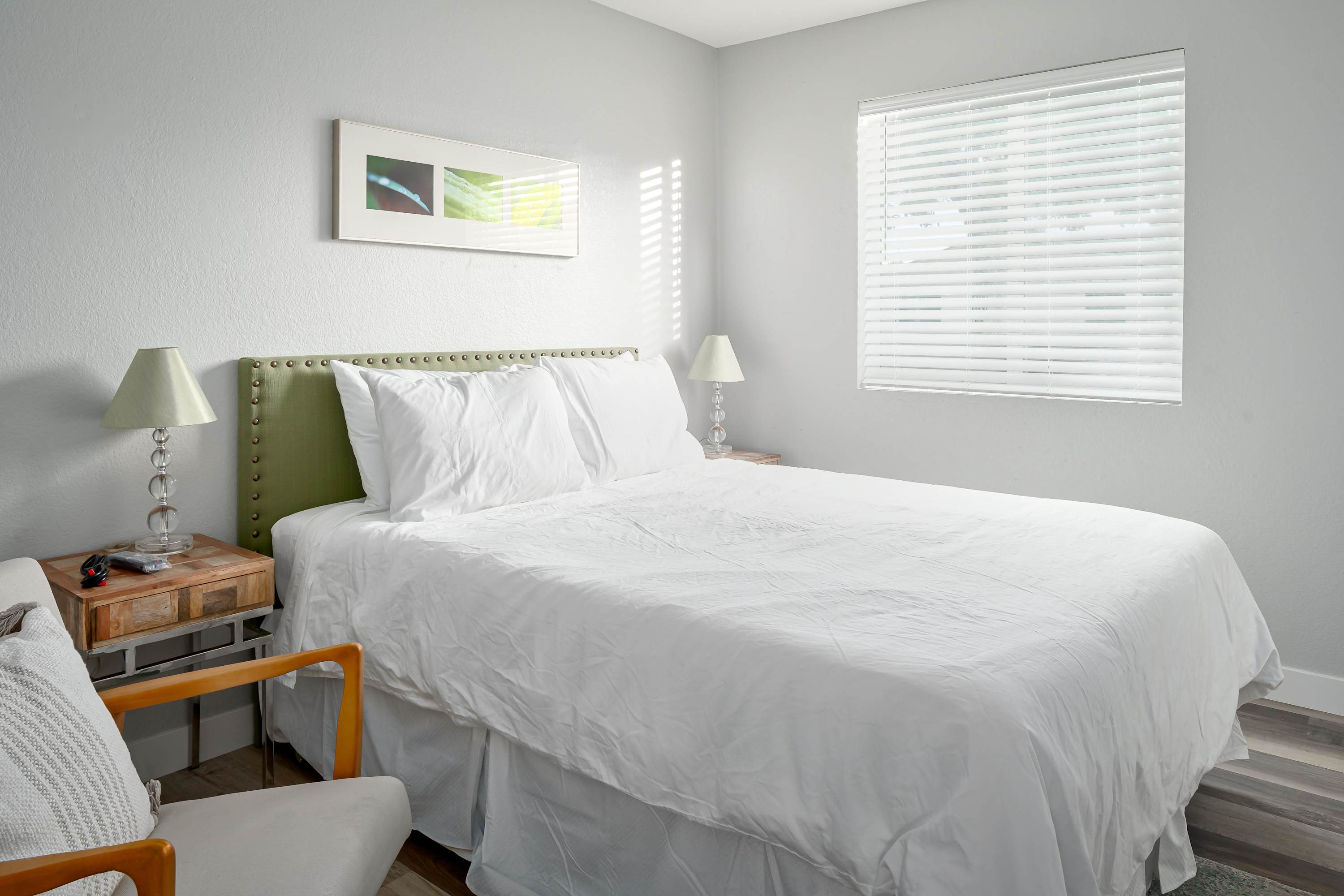 Natural light and simple accents in the guest bedroom.