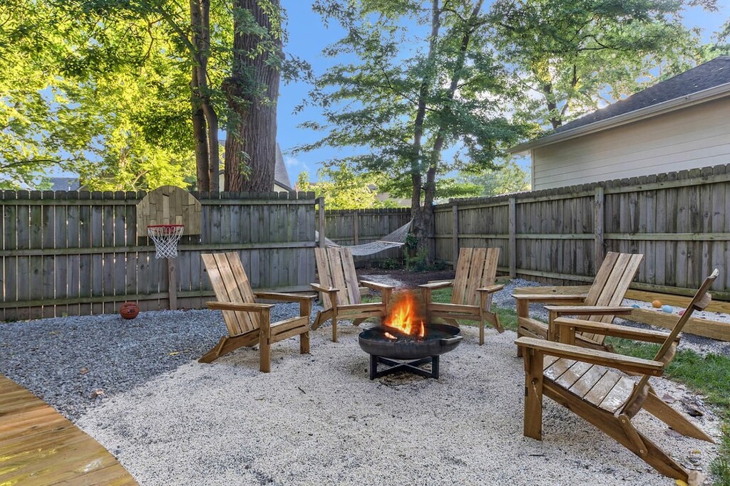 The firepit and Adirondack chairs create the perfect setting for making s'mores on chilly Nashville nights