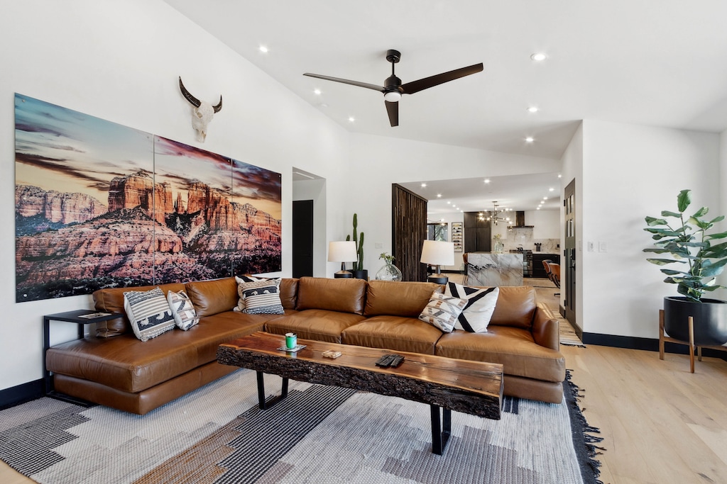 Living room with sectional leather couch, 70" Samsung TV, sound bar