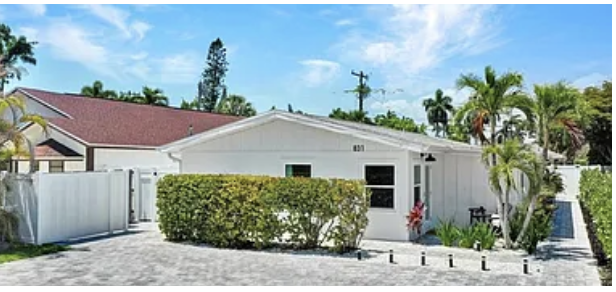 Front view from Driveway Entrance on left of bushes