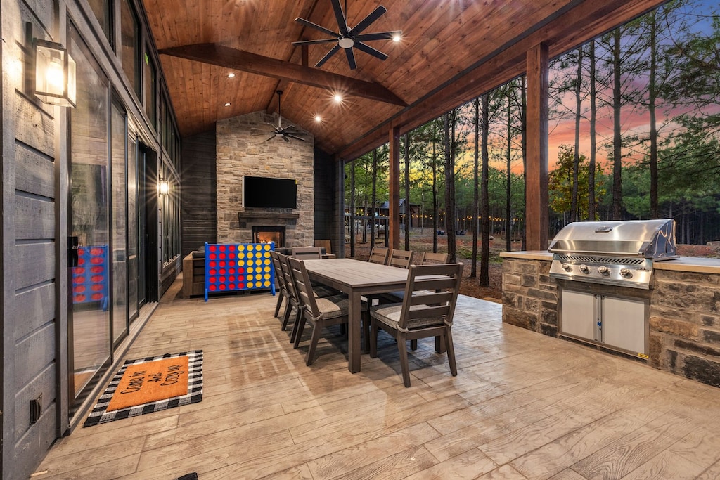 Outdoor patio area with grill (hardwired to propane) and large size connect 4