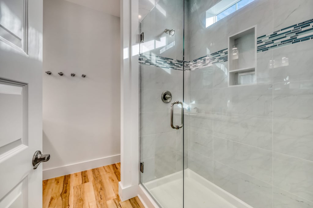 Bedroom 3's ensuite features a large shower.