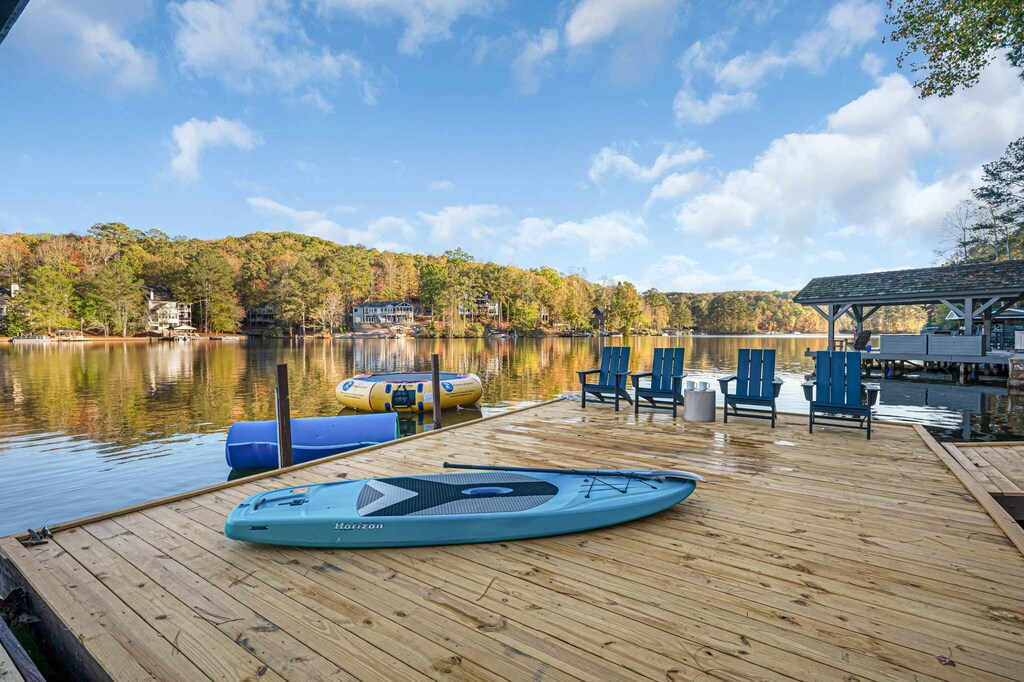 Adventure awaits on the water! Enjoy the Lily Pad, 2 canoes, paddle boards, fishing poles, and a 2-person pedal boat.