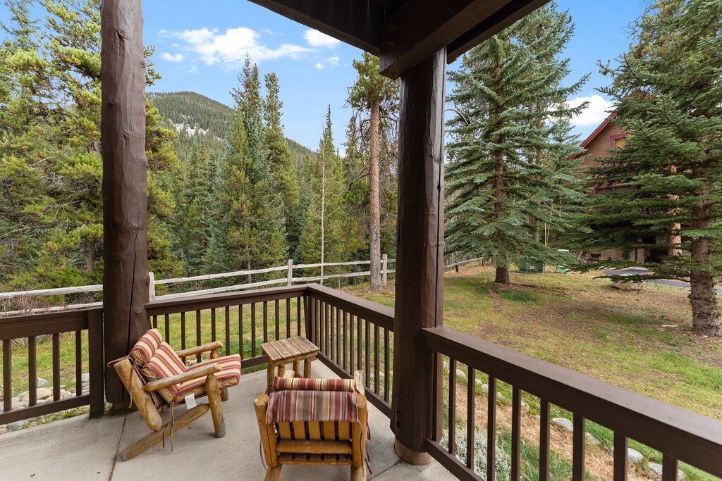 Spacious private balcony with outdoor seating.