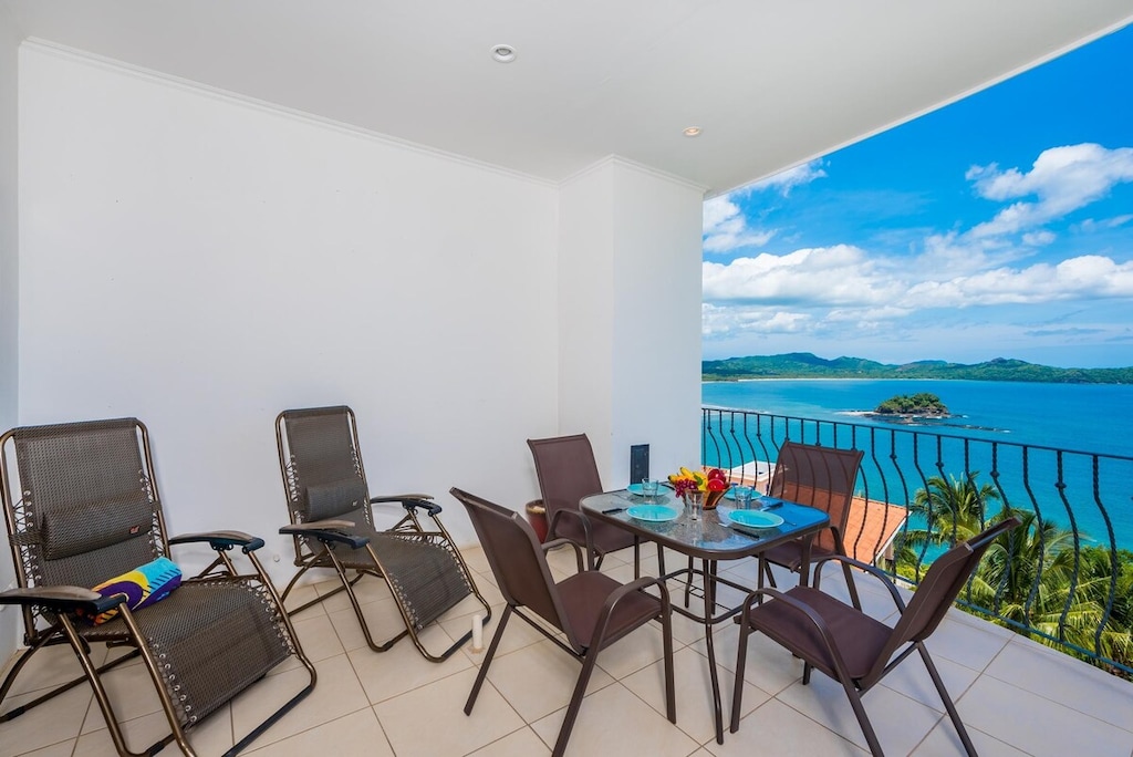 Outdoor Dining Area with Loungers