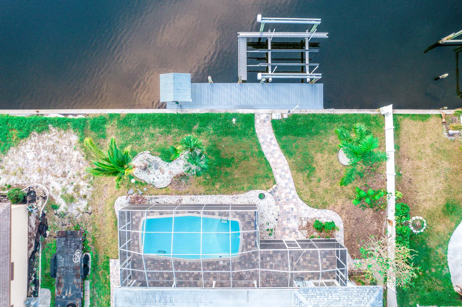 A bird’s-eye view of paradise—our pool and waterfront come together for the ultimate retreat.