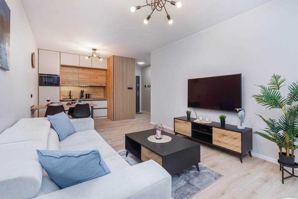 Another angle of a living room with a comfortable seating arrangement.
