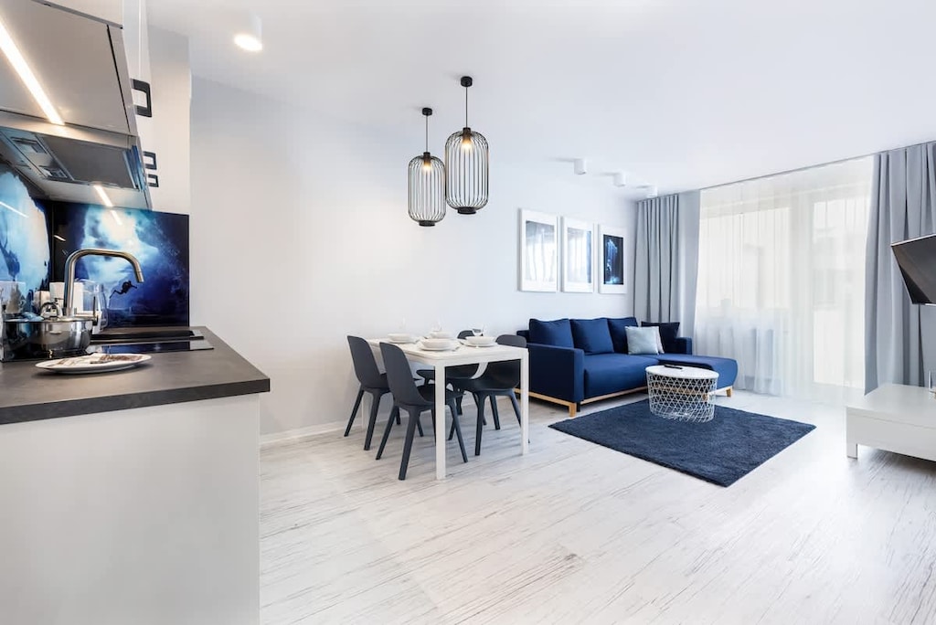 Living room with a comfortable sofa and TV. 