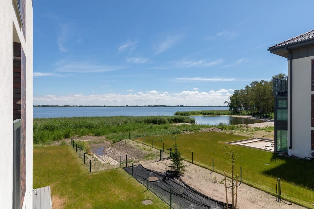 The balcony provides a serene environment for relaxation. 