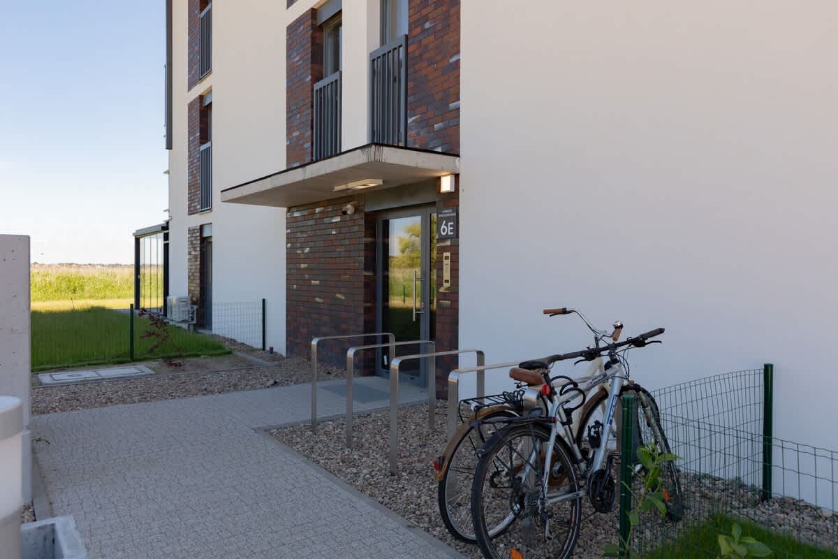 The building is close to beach and bay.