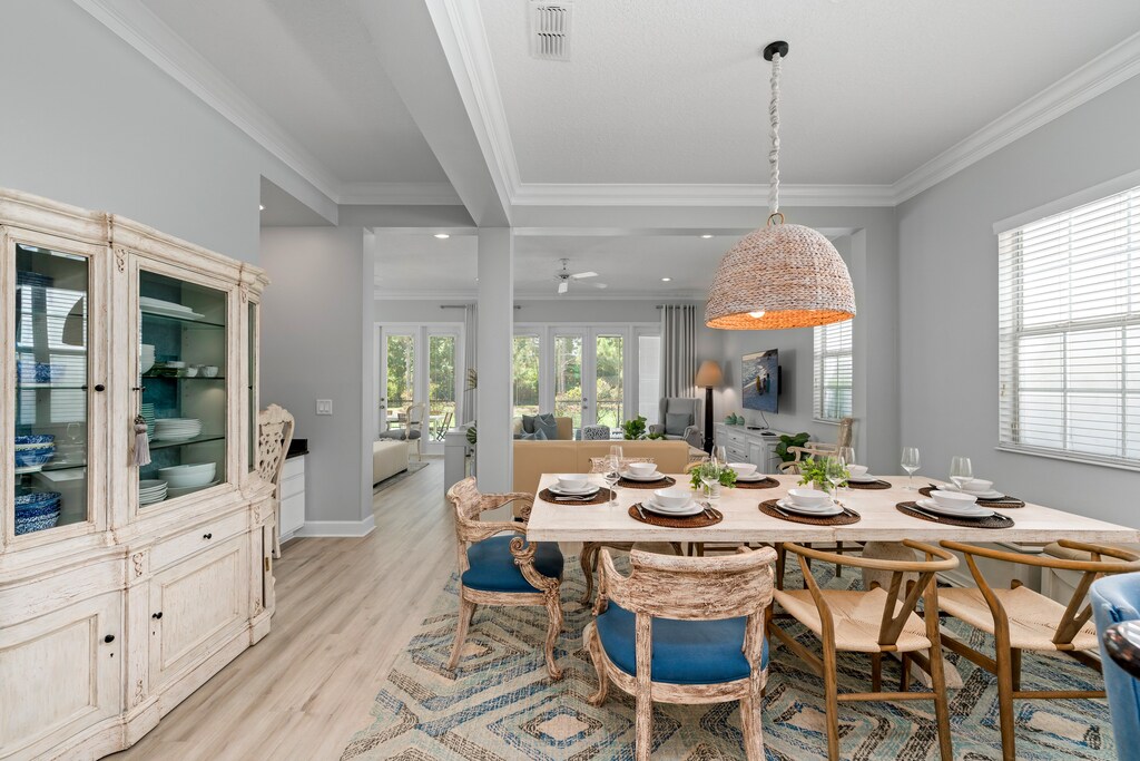 Dine in comfort and style at an 8-seat dining table in the open-concept living area.