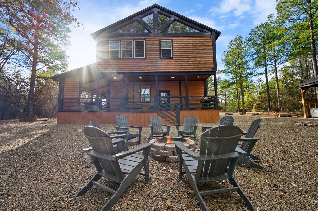 In the evening, laugh, tell stories, and make memories around the firepit with Adirondack chairs.
