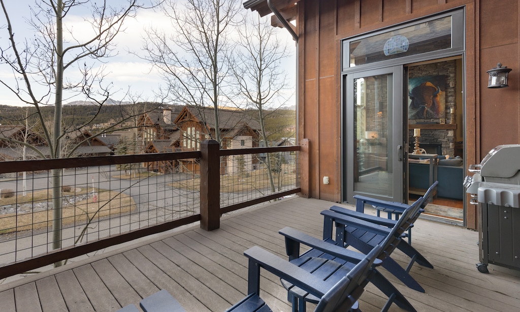 Step onto your private deck where mountain views and BBQ grilling await your perfect outdoor evening.