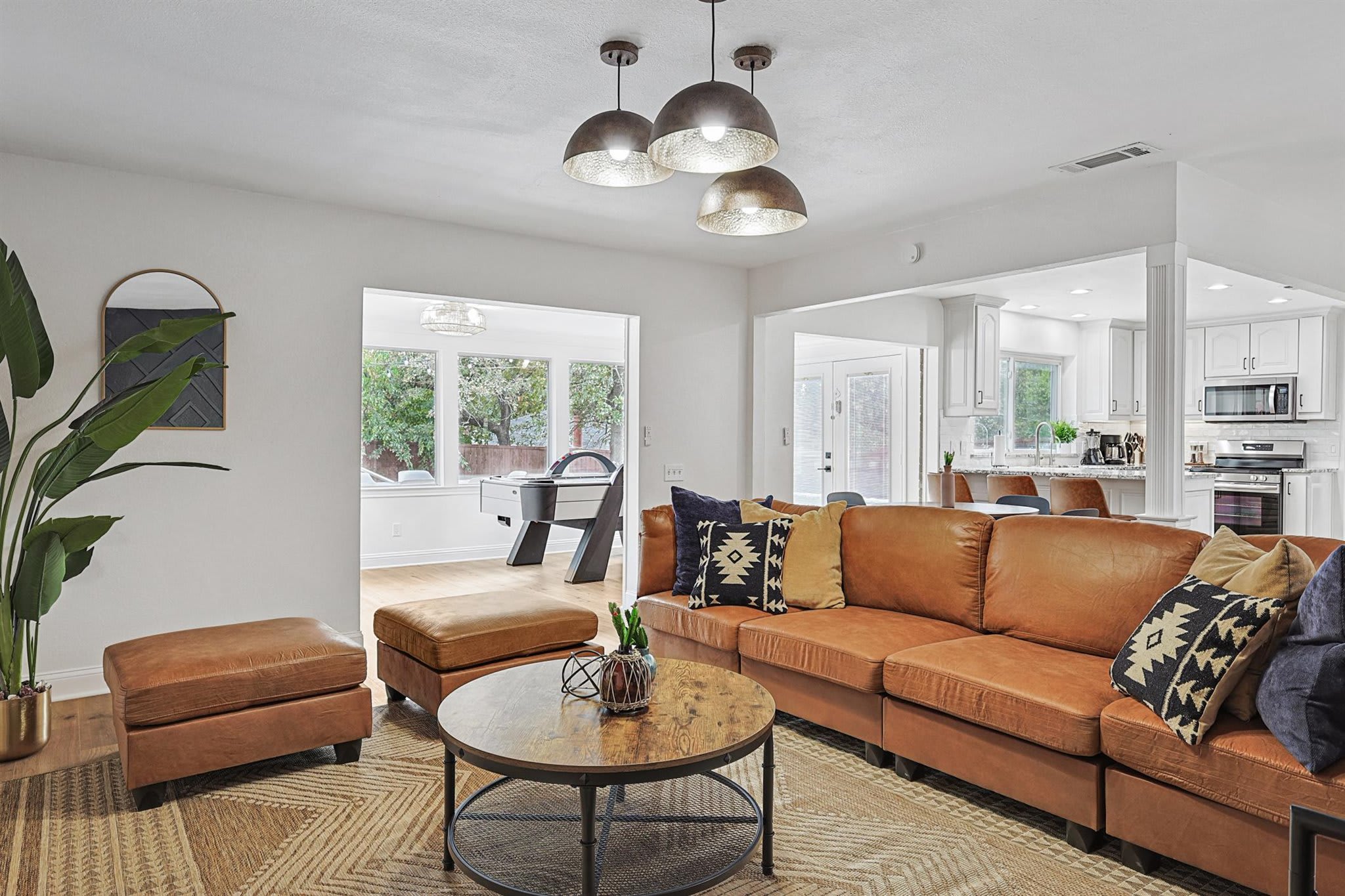 From the thoughtful designer elements to the centerpiece fireplace, this living room offers a relaxing upscale atmosphere for you to sit back and relax in.