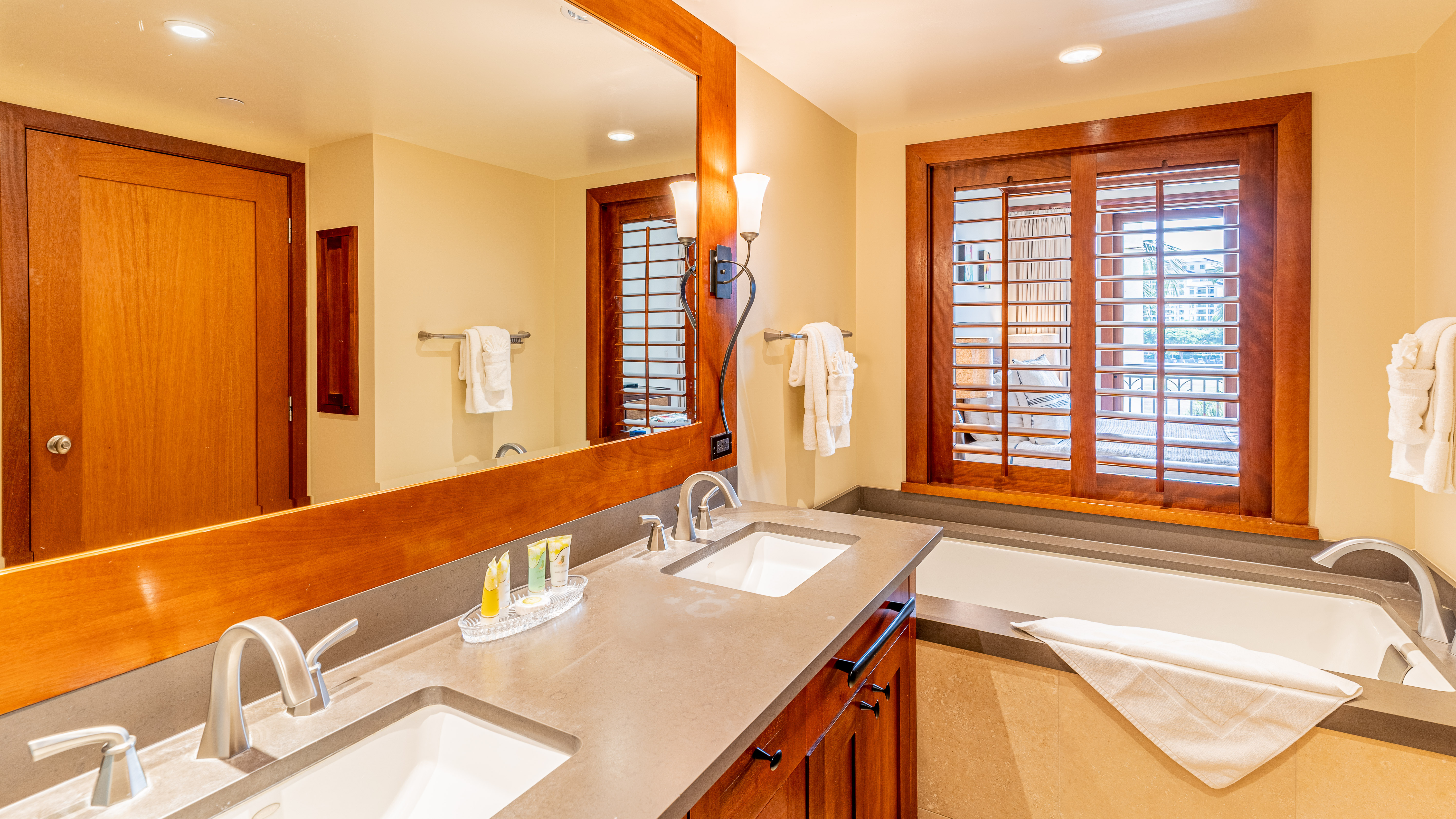 The primary guest bathroom with a luxurious soaking tub.