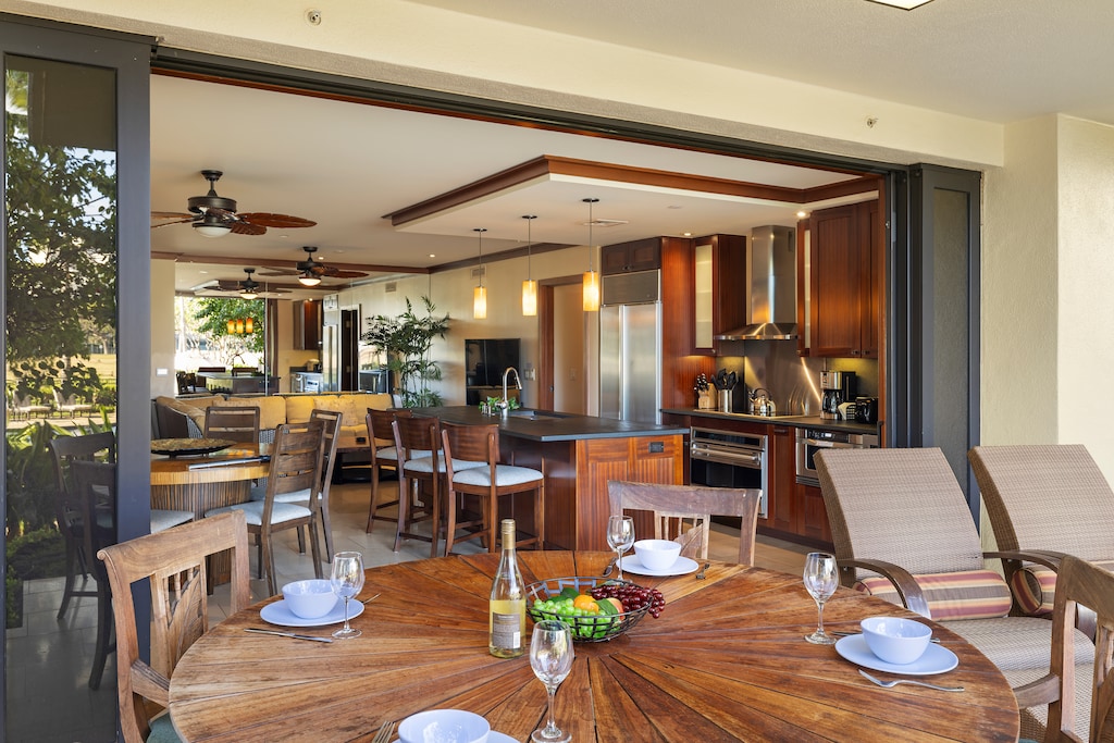 The spacious Kitchen with bar seating that opens to a large lanai.