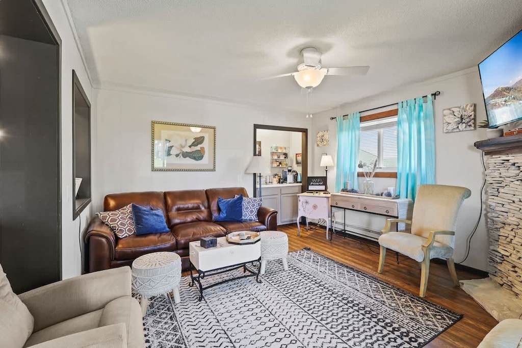 Sink into luxury with our comfortable sofa adorned with plush pillows, your ultimate relaxation spot.