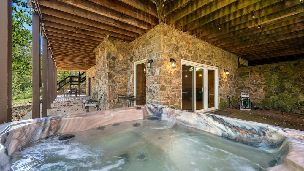 Elevate your stay with a luxurious soak in the hot tub