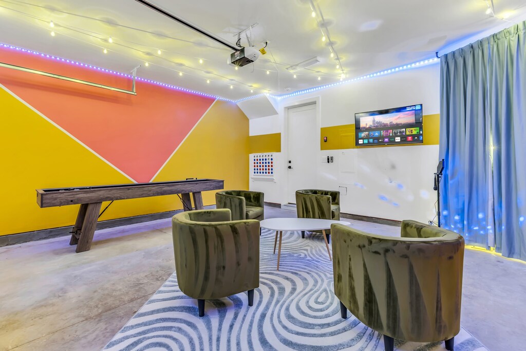 Gather your crew for unforgettable fun in this vibrant game room, perfect for laughter and bonding! Enjoy plenty of games and relaxation in our Nashville vacation home. Reserve your stay today with Misfit Homes and make lasting memories!