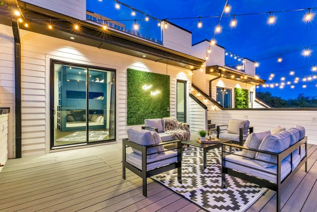 Enjoy breathtaking views from this rooftop oasis in Nashville! Relax with friends under twinkling lights—ideal for bachelorette parties or family reunions. Book with Misfit Homes for unforgettable memories!