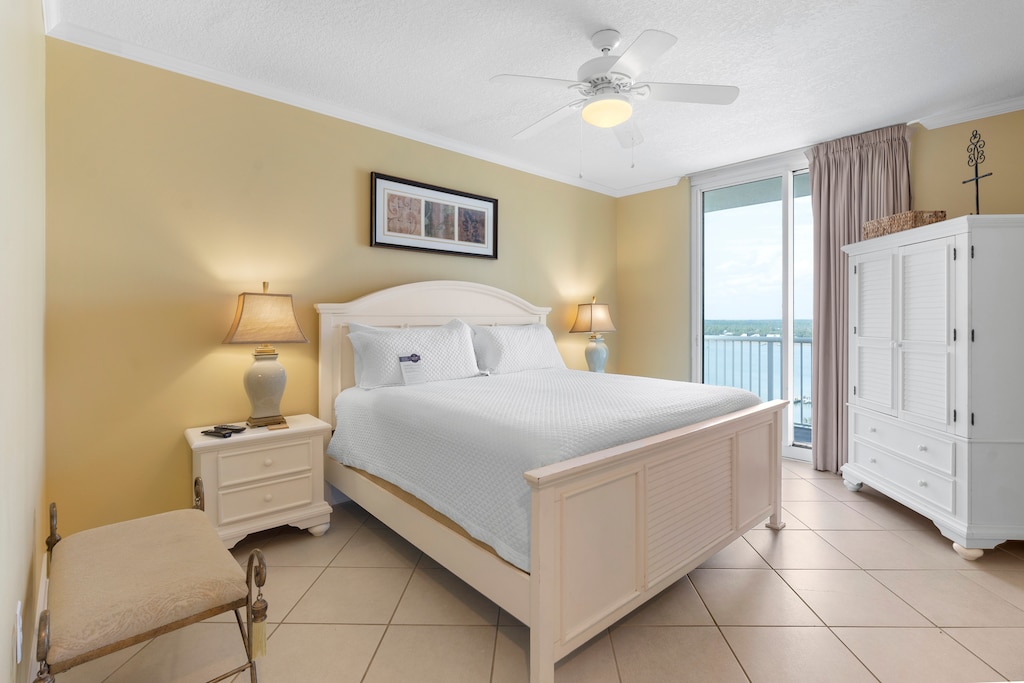 Primary bedroom with balcony access