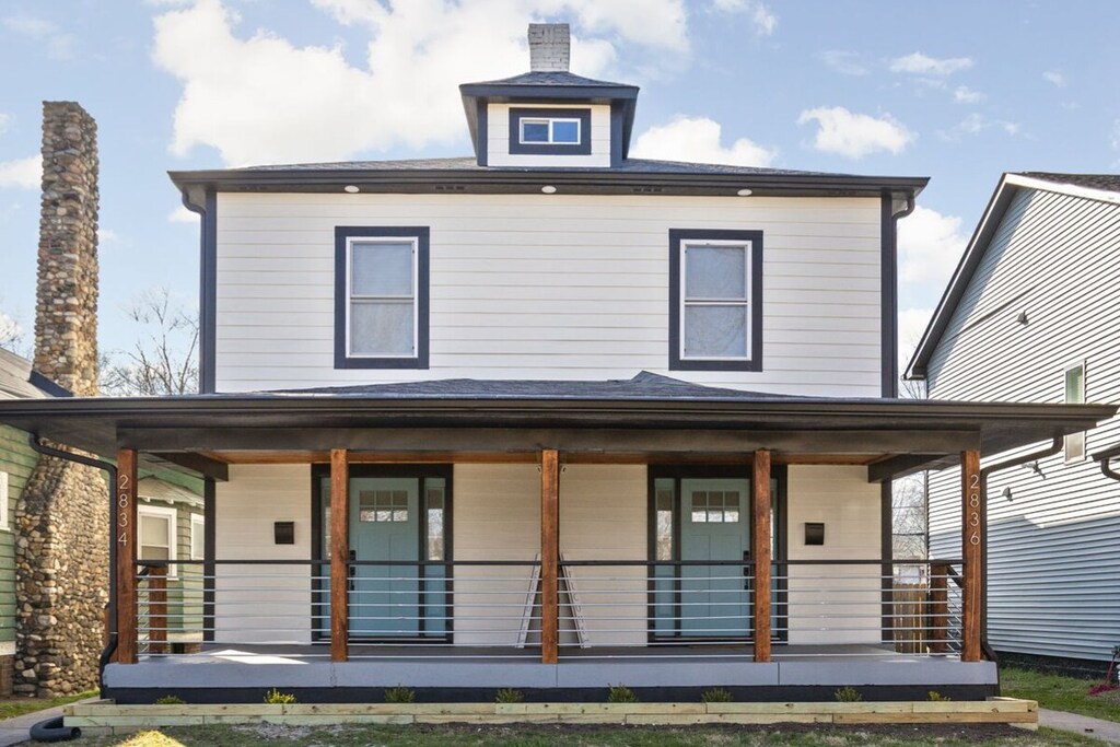 Exterior: Step into modern elegance with stylish architecture and inviting porch views!