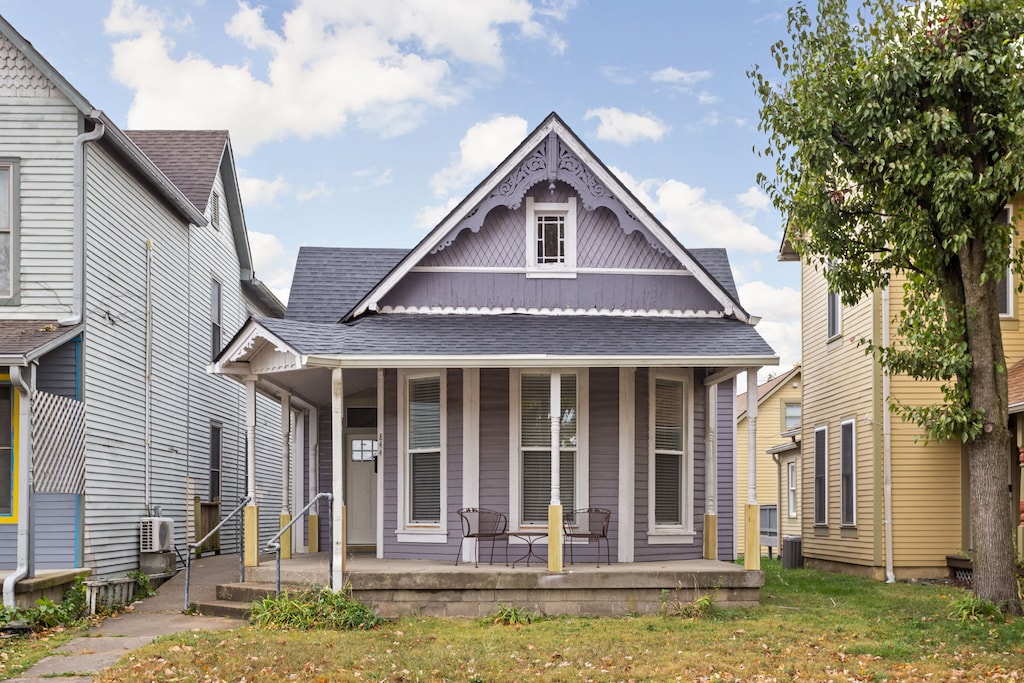 Charming Victorian Exterior: Relax on the porch in this delightful historic home in Indianapolis!