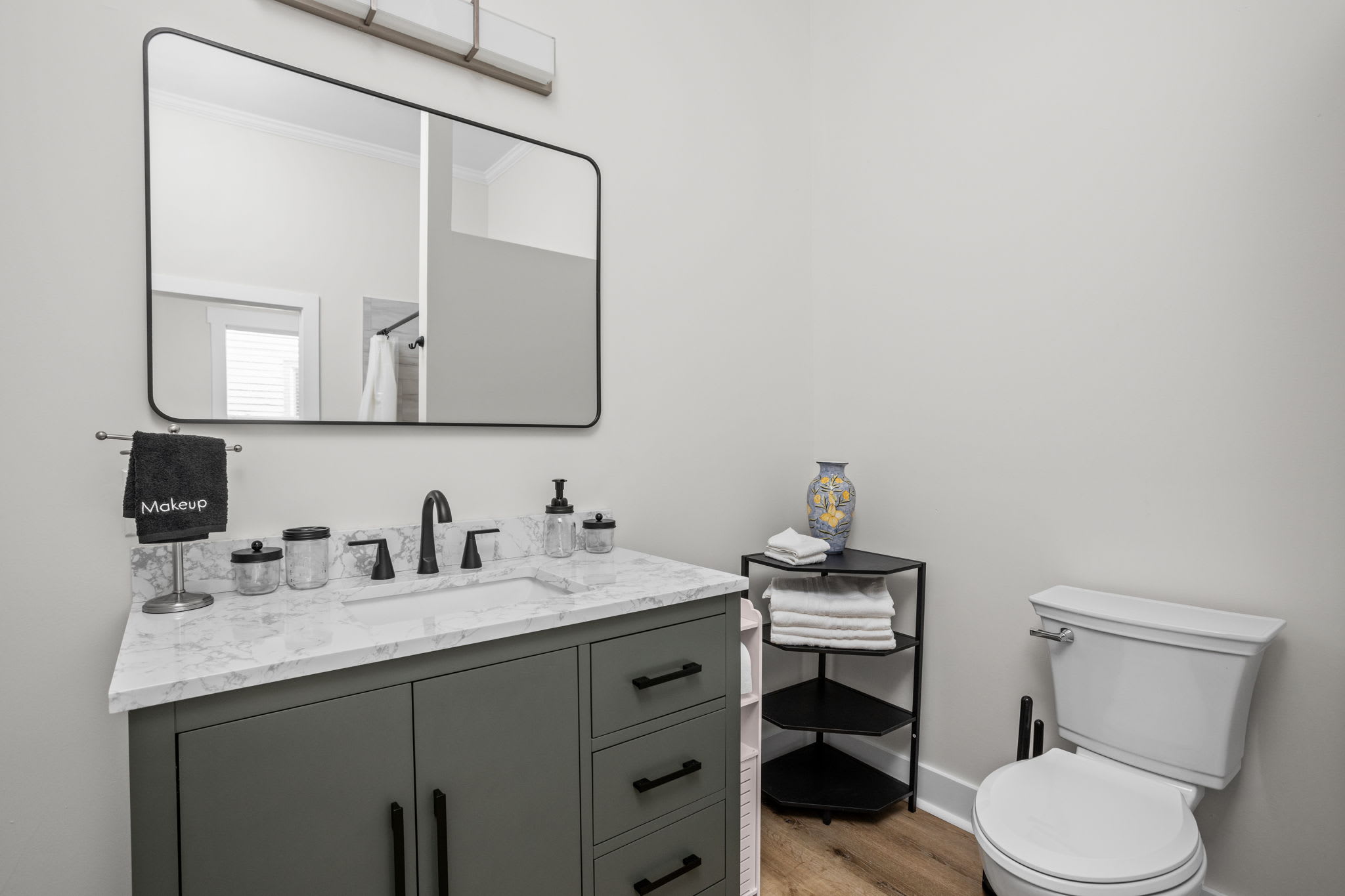 Bathroom 2: Bright modern space with a sleek vanity and stylish decor for a refreshing retreat! Bathroom 2: Bright modern space with a sleek vanity and stylish decor for a refreshing retreat!