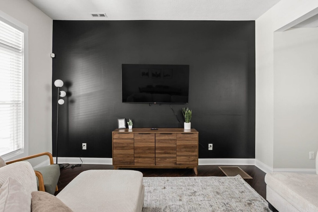 A TV for your entertainment as you unwind in our cozy living room